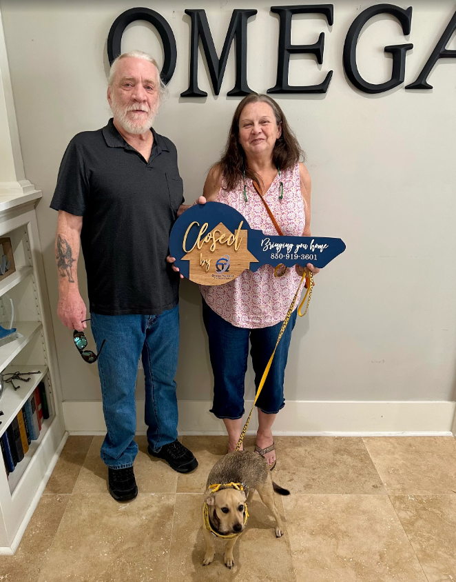 Veteran couple reviewing VA loan service requirements